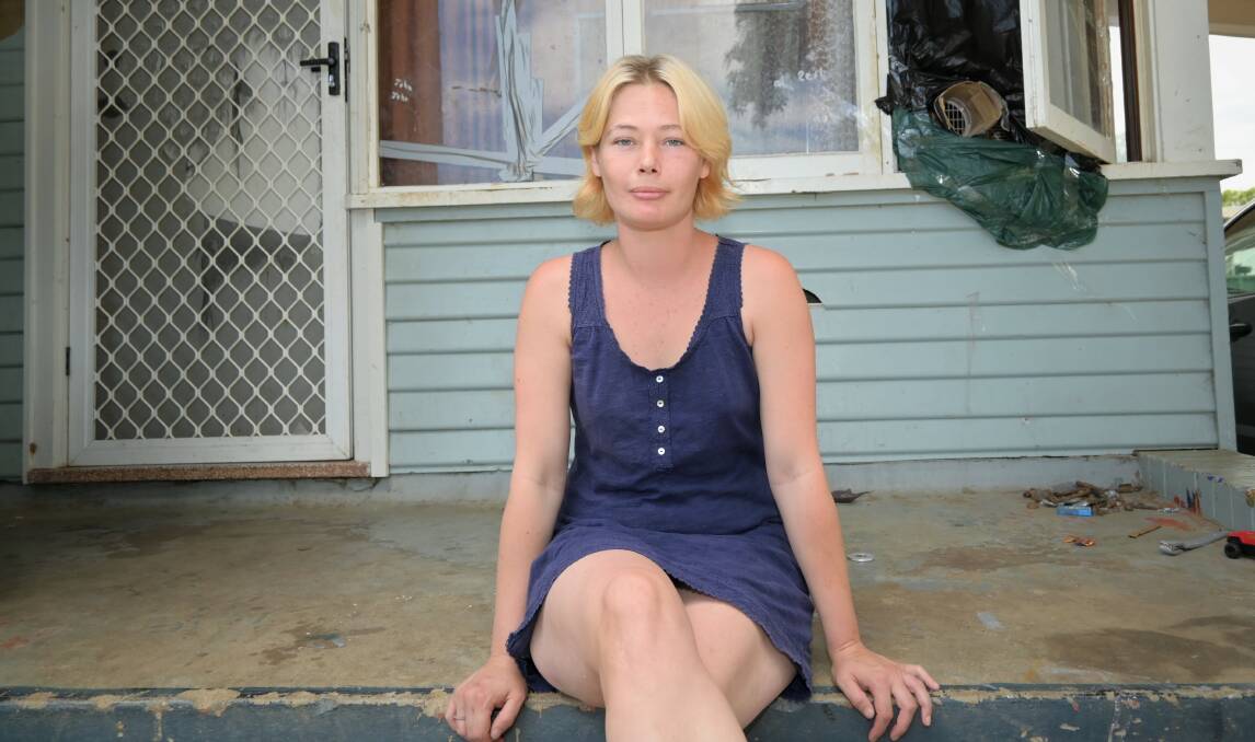 Mother-of-four Cassandra Wood lives in a house that is literally falling apart, making her fear for her family's safety. Picture: Kenji Sato