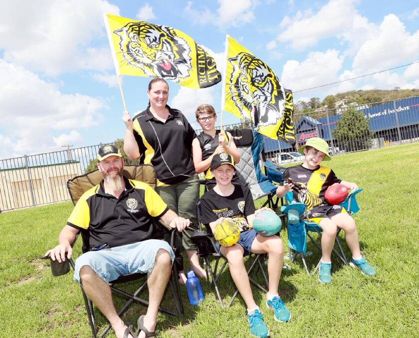 FOOTY FAMILY: The Spence family from Forest Hill: Mark and Kristy with their children, Caleb, 12, Archer, 8 and Brock, 9. Picture: Les Smith
