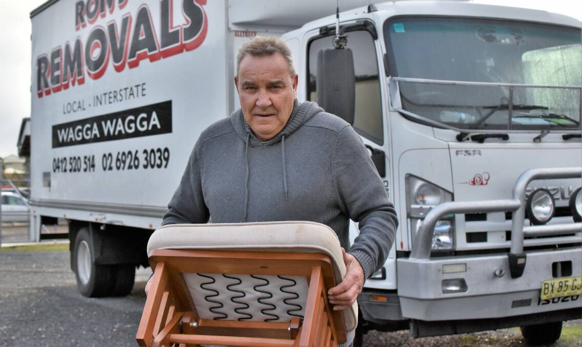 Truck driver Ron Lee is delivering free furniture to the fire-stricken families of Tumbarumba and Batlow. Picture: Kenji Sato