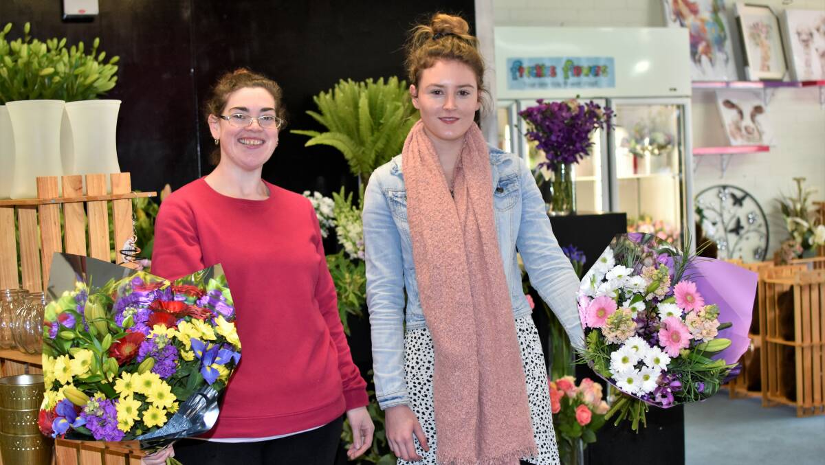FLOWER POWER: Freckles Flowers owner Katrina Dosser and employee Sarah Carnie say JobKeeper has been a lifeline for them during the coronavirus lockdown. Picture: Kenji Sato