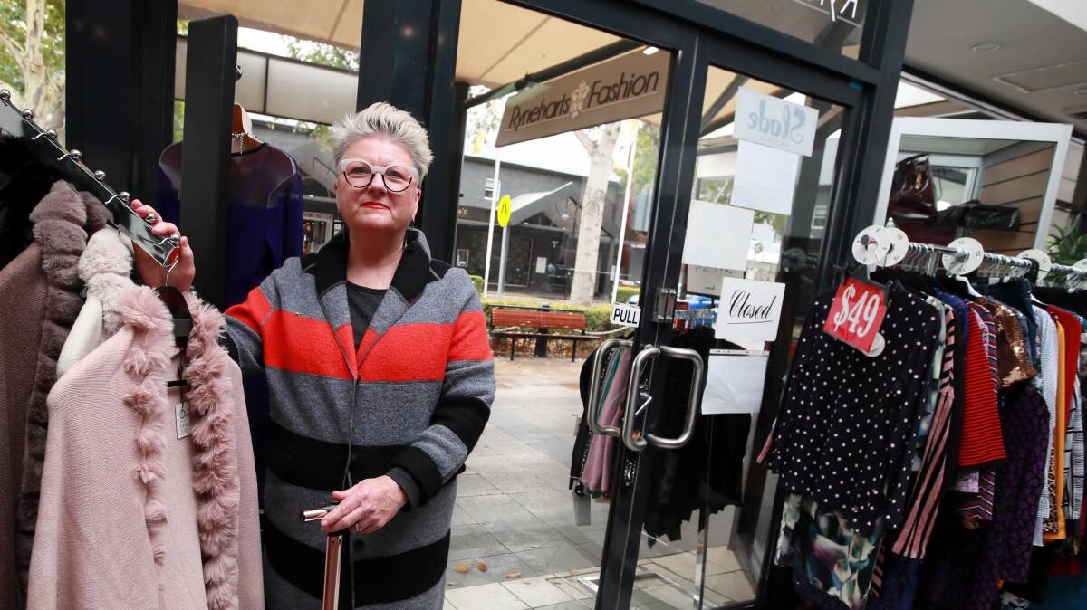 GLASS HALF FULL: Rynehart's Fashion Boutique owner Jackie Gash has thrown open her doors. Picture: Les Smith