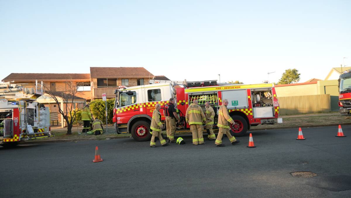 FRNSW crews packing up after the Bruce Street fire. Picture: Kenji Sato
