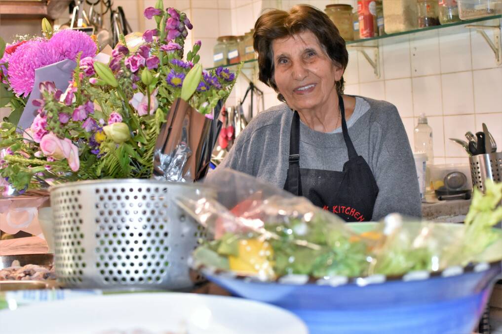 BIRTHDAY GIRL: Nabiha Koriaty received many bunches of flowers from wellwishers for her 80th birthday. Picture: Kenji Sato