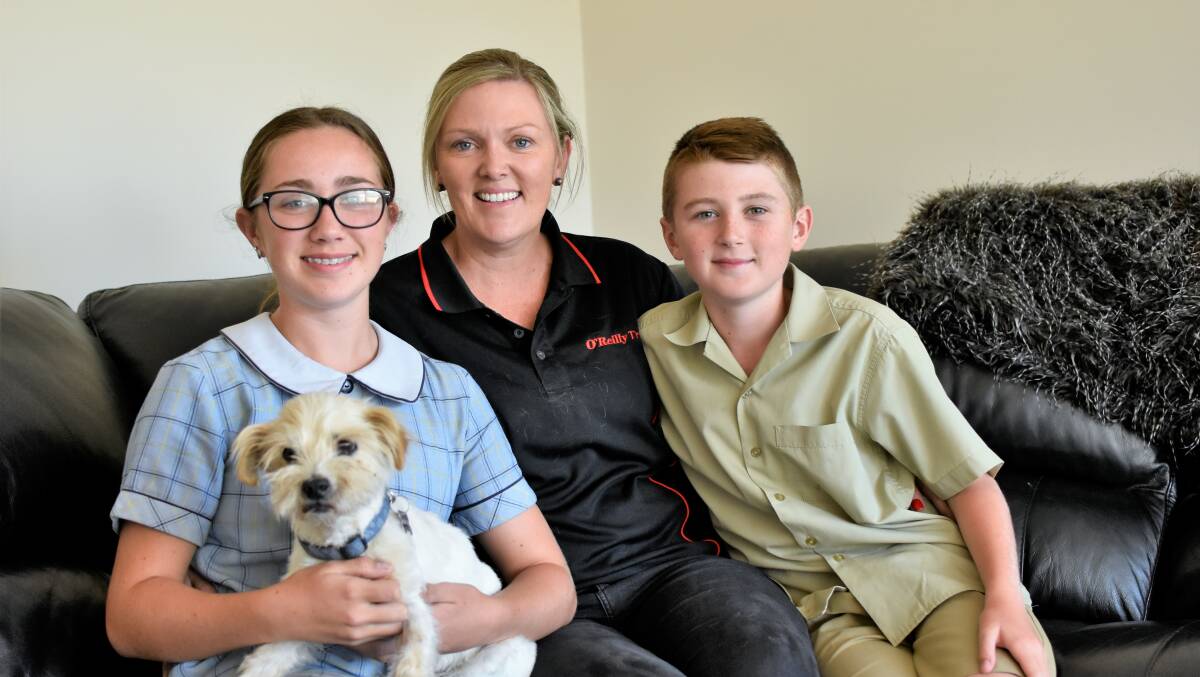 SUNSAFE FAMILY: Bree O'Reilly, Tracey O'Reilly, Charlie O'Reilly, and Lilly the dog. Picture: Kenji Sato