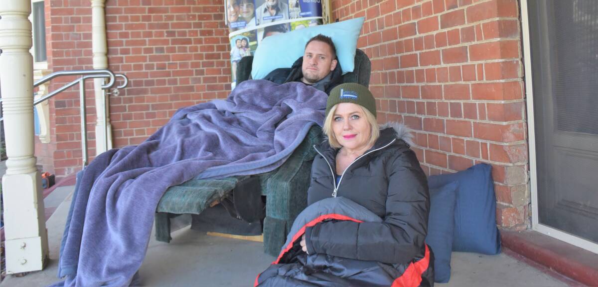 COSY: Mark Atkinson and Jodie Godfrey are raising money to help shivering sleepers this winter. Picture: Kenji Sato