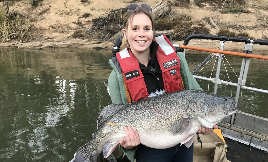 GONE FISHIN: Charles Sturt University researcher Leia Rogers and a Murray Cod. Picture: Contributed