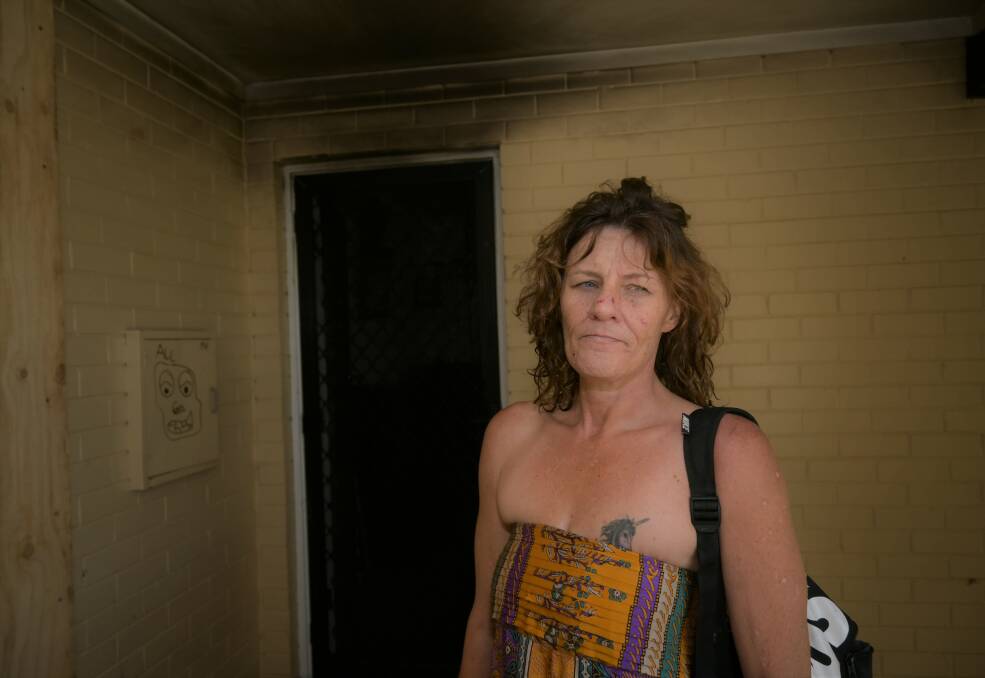 BURNT OUT: Kellie Egan woke up one day to find her house had been torched. She says such things are a fact of life for Bruce Street residents. Picture: Kenji Sato