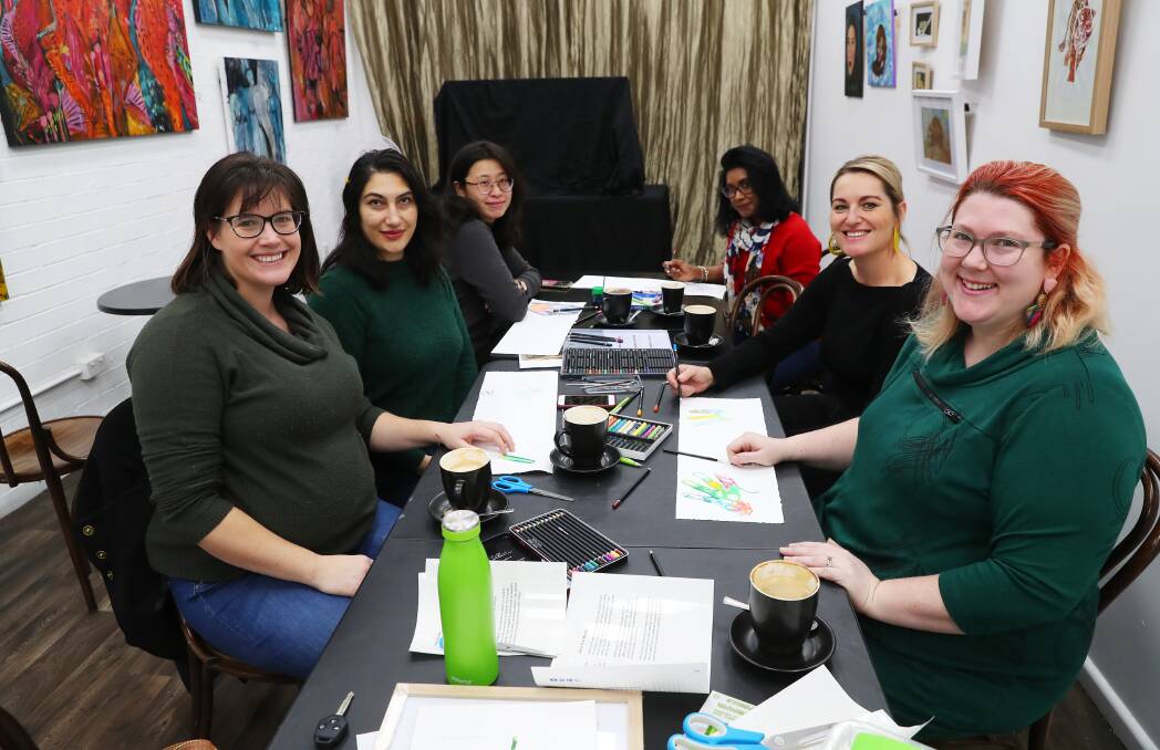 COLOURFUL CAST: STARTTS' Laura Johnston, Zahra Khan Moradi, Chai-Yen (Charlie) Lee, Sharomi Dayanand, Create Hub's Claire Harris and art teacher Elaine Camlin get creative at the newly formed Multicultural Women's Art Group. Picture: Emma Hillier
