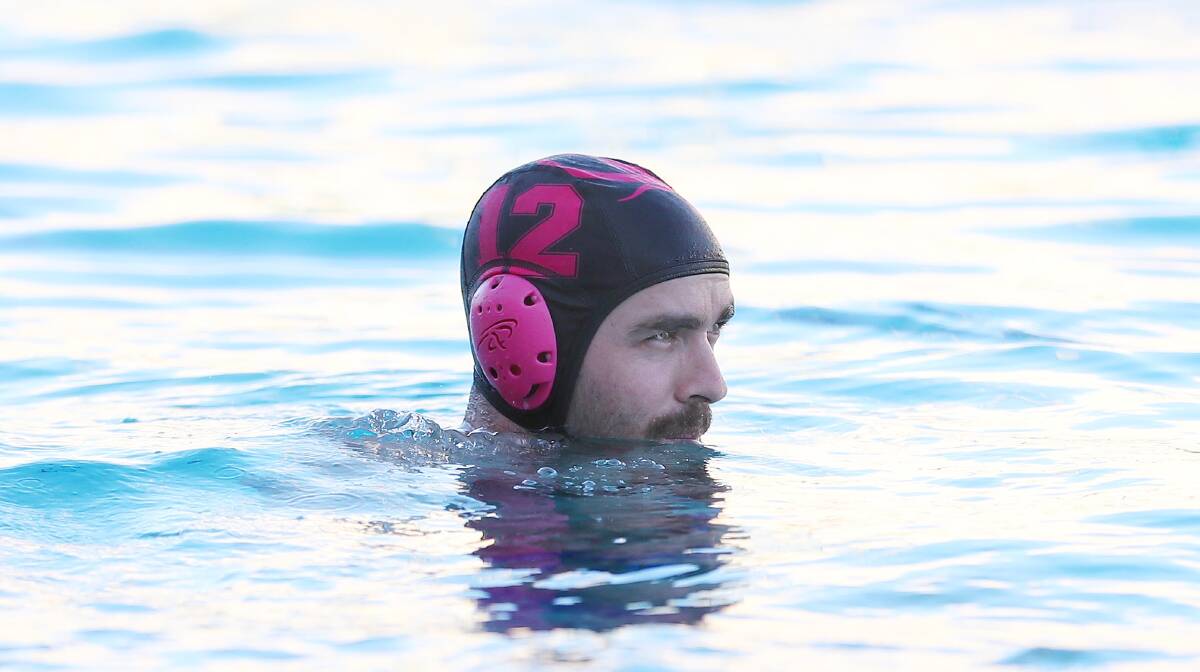 KEEPING A LOW PROFILE: Ryan Robertson and his Octopuses Pink teammates were among those deprived of A grade water polo action on Tuesday due to lightning. Picture: Kieren L Tilly