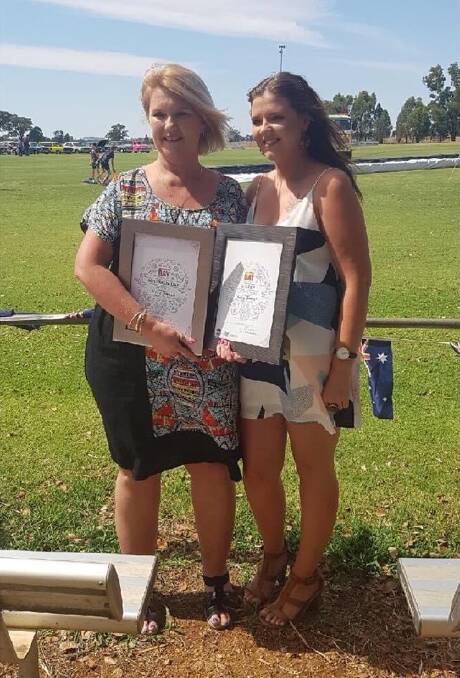 COMMUNITY SPIRIT: Kelly Forrest and Ash Craig, who organise The Rock's B&S, pictured here at Ms Forrest's Lockhart Shire Council Citizen of the Year ceremony. Picture: Supplied