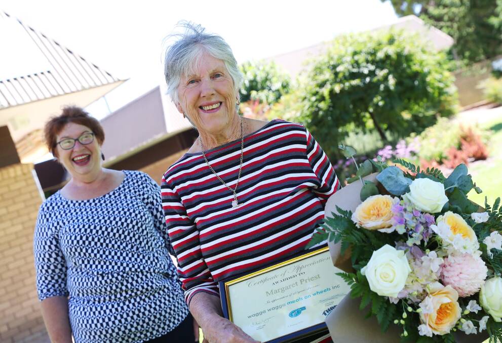 GRATITUDE: Meals on Wheels manager Julie Logan thanked Margaret Priest for her long-standing contribution to Wagga. Picture: Emma Hillier