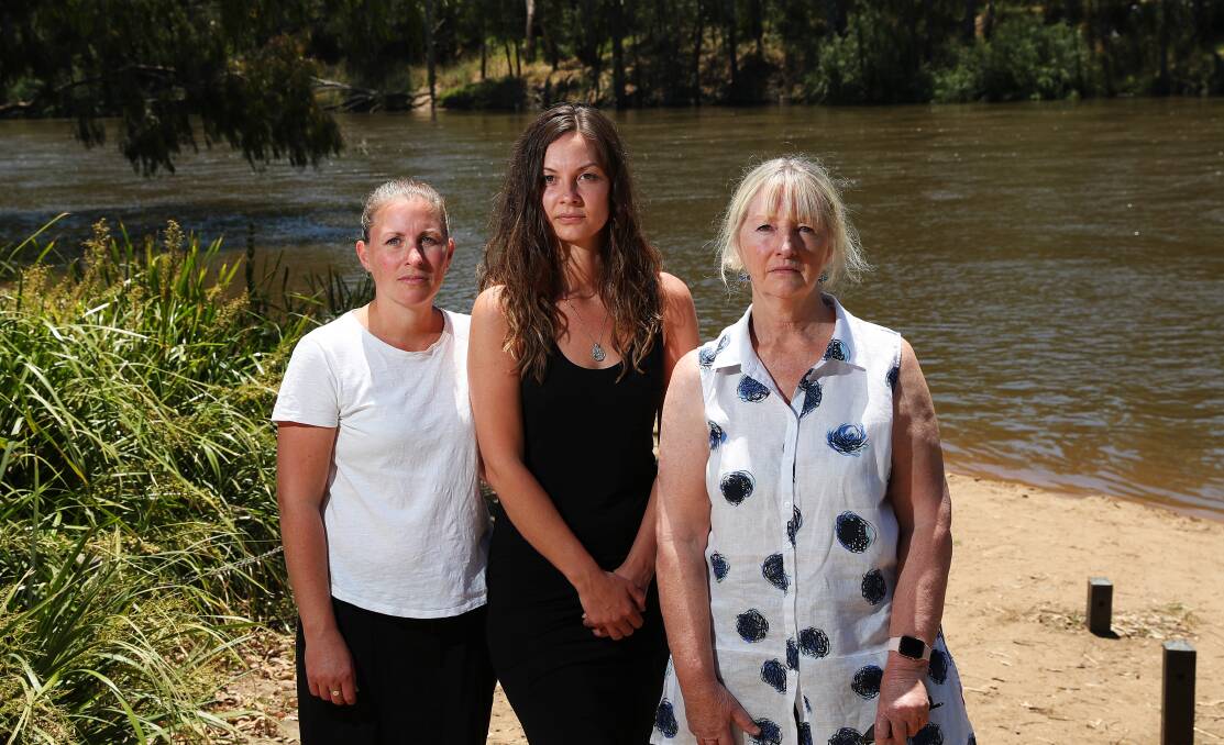 CHANGE NEEDED: Sally and Felicity Benedyka with their mother Jenny McKinnon have been calling for a defibrillator for Wagga Beach. Picture: Emma Hillier