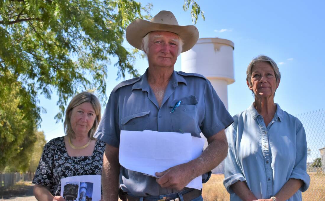 UNHAPPY: Yerong Creek residents Justine Isherwood, Shayne Collins and Leigh Rowell with their petition opposing the design. Picture: Catie McLeod