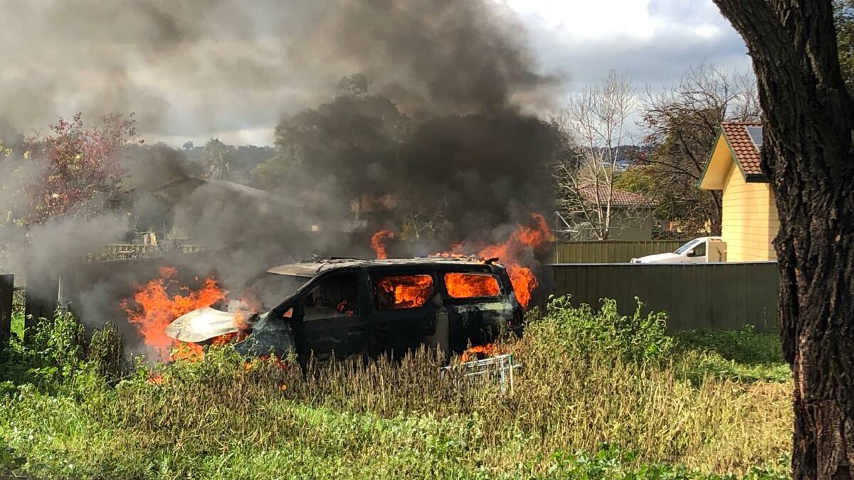 Firefighters were twice called out to extinguish flames engulfing the van. Picture: Les Smith