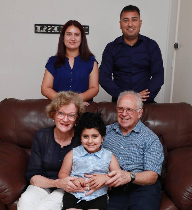 FRIENDSHIP: Helen O'Connell and Bruce Leary with Dima Smoki, 5, and her parents Khalaf Smoki and Layla Mahmod. Picture: Les Smith