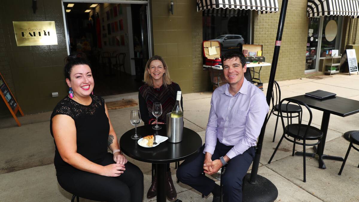 GREAT OUTDOORS: The Wagga Business Chamber's Serena Hardwick, The Curious Rabbit Owner Vickie Burkinshaw and Council economic development officer Dominic Kennedy enjoying alfresco dining. Picture: Emma Hillier