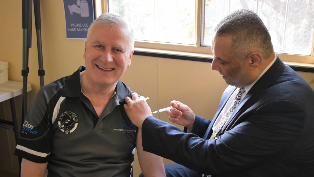 THE JAB: Michael McCormack rolls up his sleeve to get his coronavirus vaccine at Glenrock Country Practice. Picture: Catie McLeod