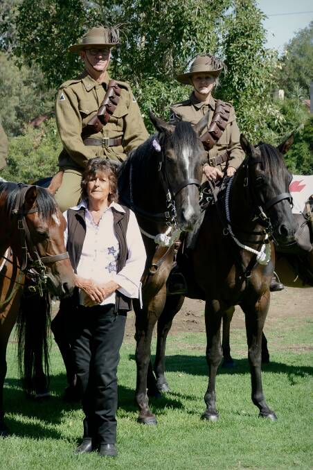 Betty Miller with some of the Riverina Light Horse Troop. Picture: Supplied.