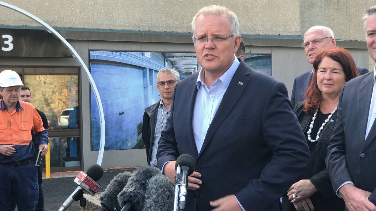 TICK OF APPROVAL: Prime Minister Scott Morrison at a press conference in Talbingo last year.