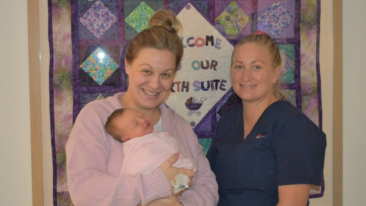 CLOUD NINE: New mum Chantelle Clunes, with her brand new baby and midwife Sarah Eyles at Wagga Base Hospital. Picture: Catie McLeod