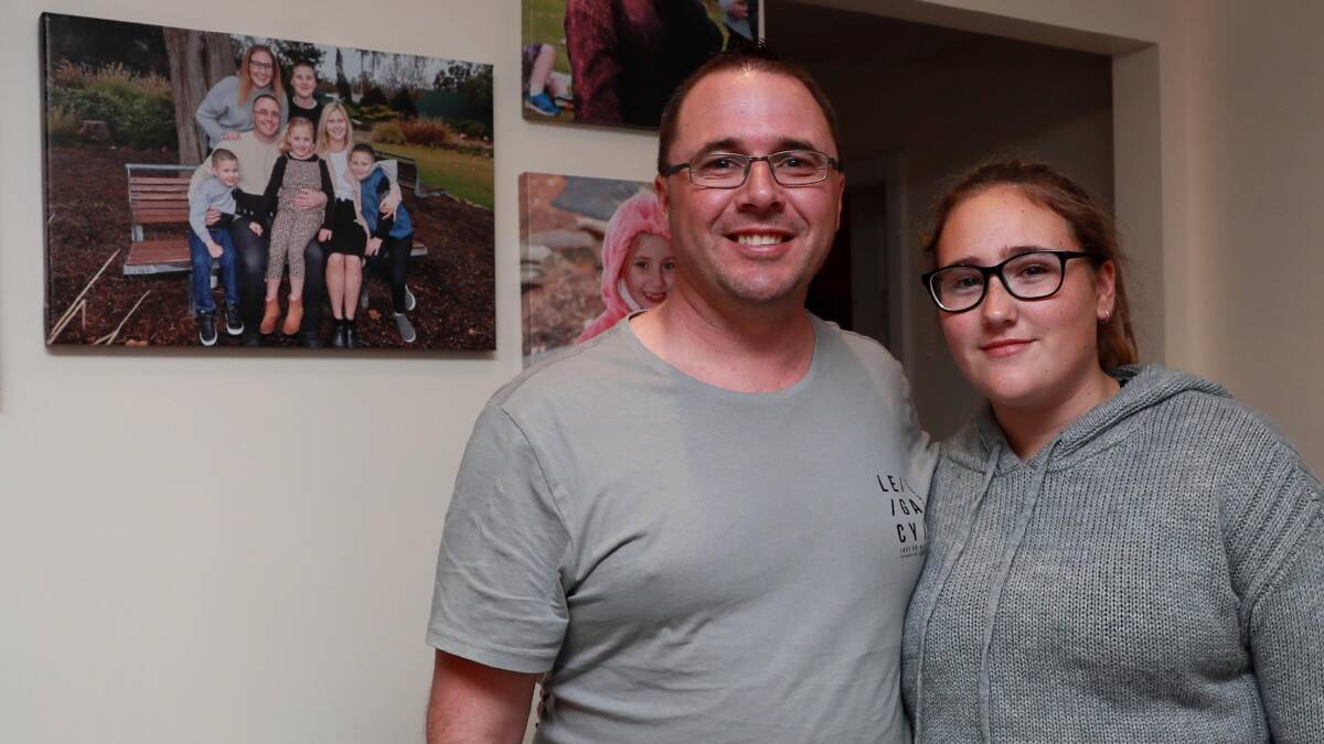 ANTICIPATION: Aidan Vivian and his eldest daughter Ashleigh-Maree, 14 are excited for babies Marlie and Matilda to arrive at home. Picture: Les Smith.