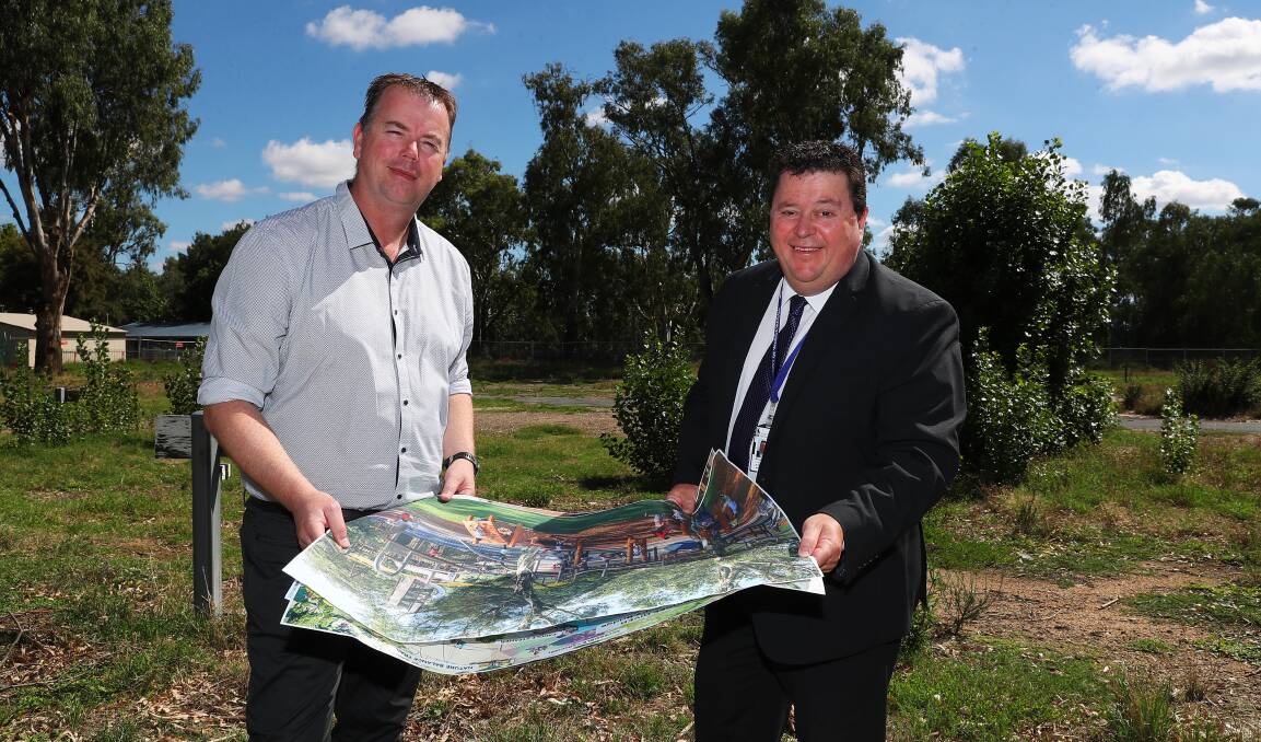 ON THE TABLE: Wagga City Council planner Ben Creighton with director of regional activation Michael Keys, who will be working on the CBD plan. Picture: Emma Hillier
