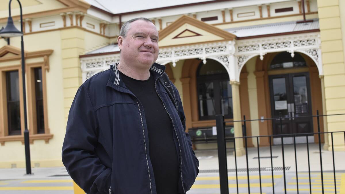 RACE AGAINST TIME: Former Wagga man Patrick Gribble arrives in the city by train yesterday - one of two trips from Melbourne before the border closes. Picture: Kenji Sato