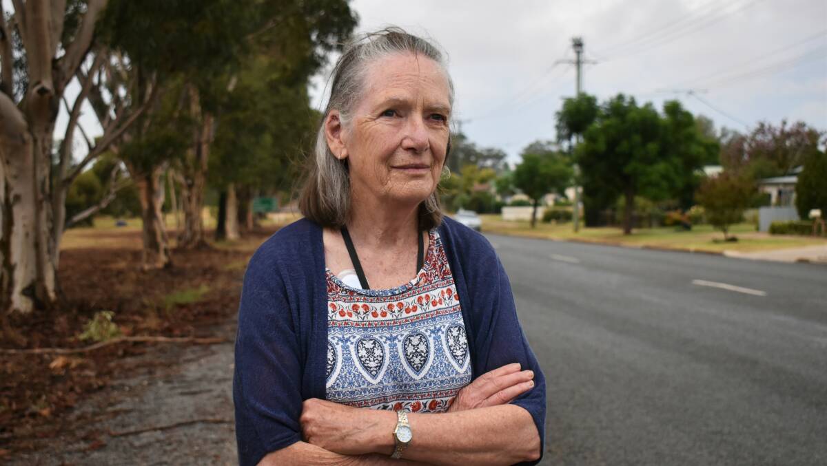 CHANGE OF PLANS: Geraldine Gradon looks down Wade Street where houses are built on one side and the other is currently empty land. Picture: Catie McLeod