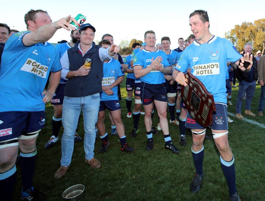 FITTING FINALE: Harry Hosegood (holding shield) won the Rivcoll Old Boys Medal for the second straight year in his final game for the Waratahs. Picture: Les Smith