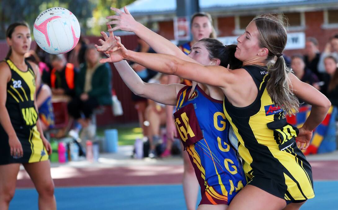 TUSSLE: GGGM's Paige Kenny contests the ball against Wagga Tigers on Saturday. Picture: Emma Hillier