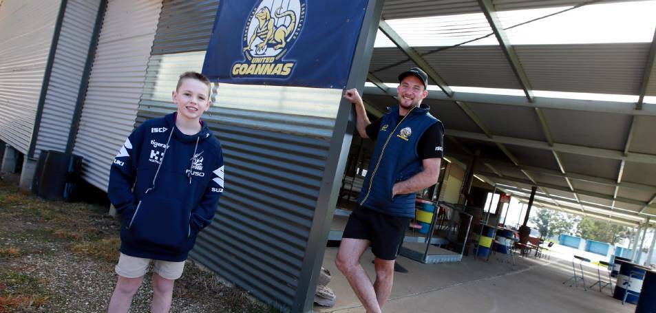 GOOD SHIFT: Jesse Cunningham, pictured with club junior Ned Jones when he assumed the Mangoplah-Cookardinia United-Eastlakes presidency in 2020, is standing down. Picture: Les Smith 