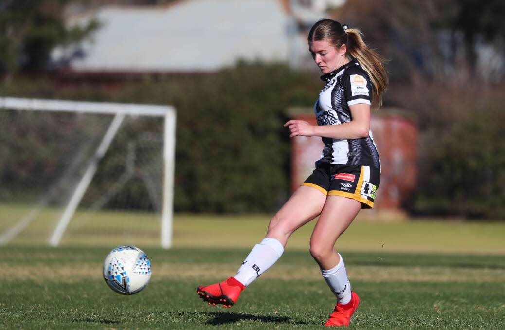 BUSY DAY: Tia Lyons in action for Wagga City Wanderers this season. Picture: Emma Hillier
