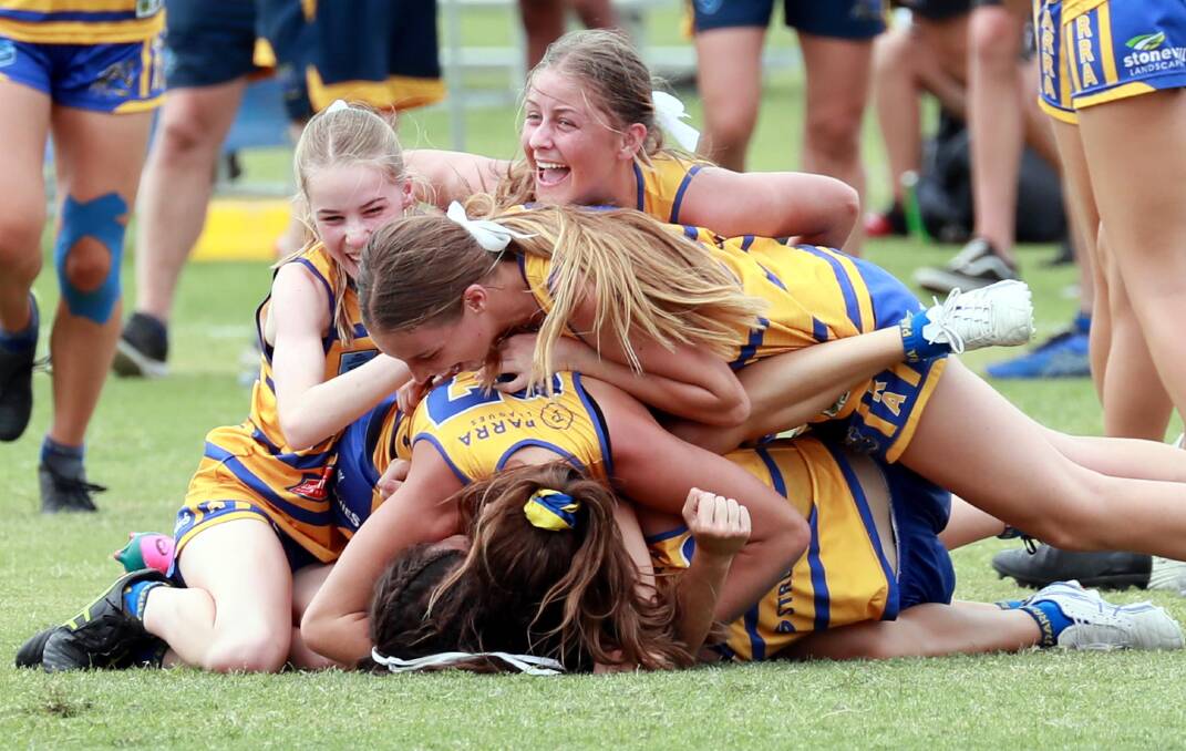 JUBILANT FEELING: Parramatta Eels' 16 years girls celebrate their final win over Wagga Vipers on Sunday. Picture: Les Smith