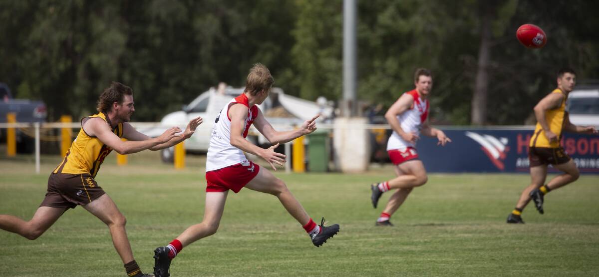 The Hawks were too strong for the Demons at Gumly Oval. Pictures: Madeline Begley