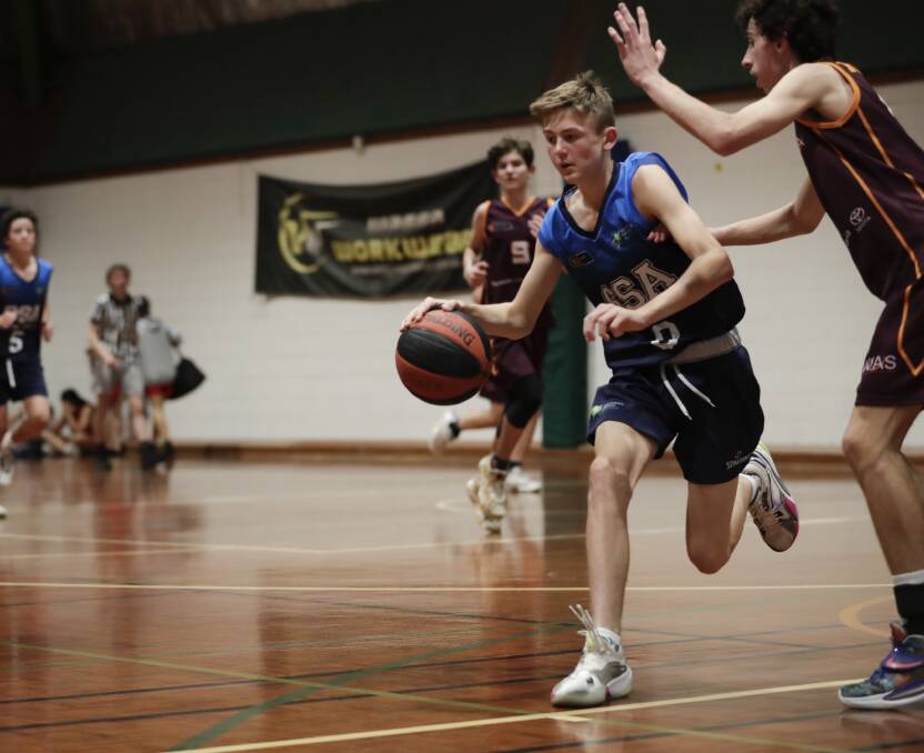 SSA's Lucas Matthews dribbles down the court during an under-16 basketball game. Picture: Madeline Begley