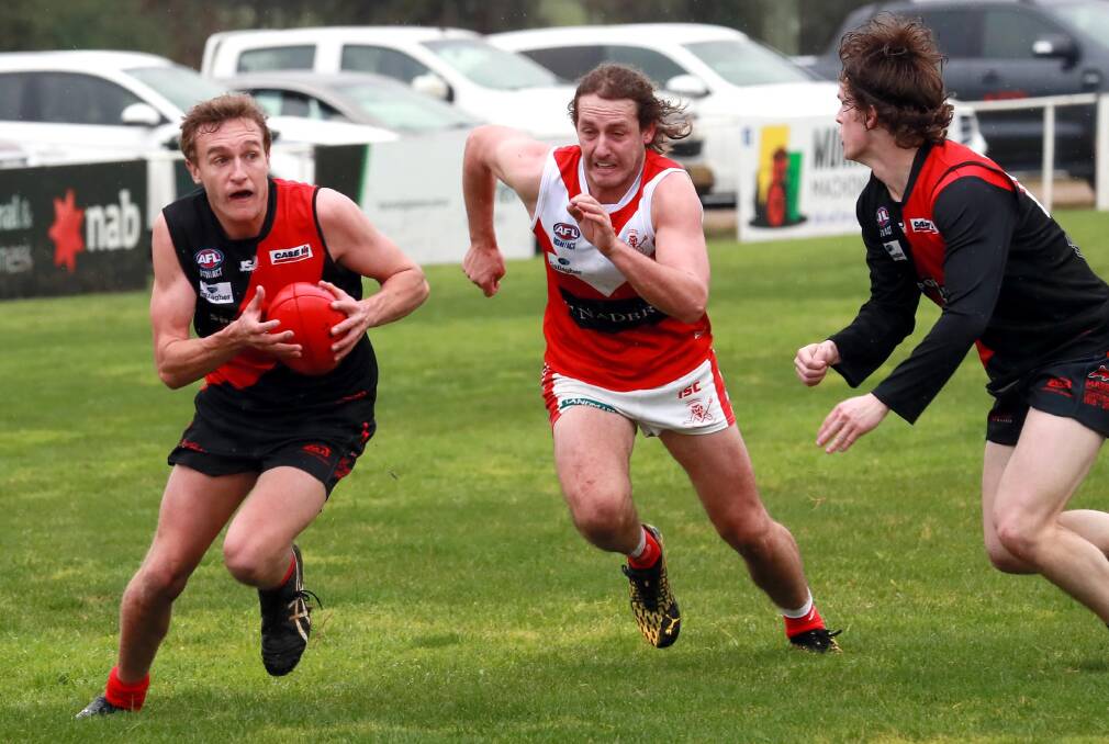WITHDRAWN: Marrar's Jack Reynolds, Collingullie-Glenfield Park's Nick Perryman and Marrar's Toby Lawler in action during the weekend's trial match. Picture: Les Smith
