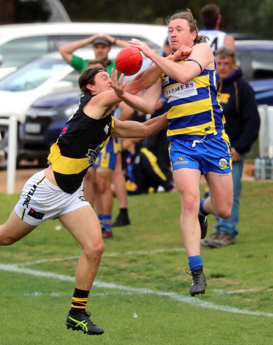 BIDING TIME: Sydney-based player
Jack Collins takes a mark for MCUE
last year against Wagga Tigers.
Picture: Les Smith