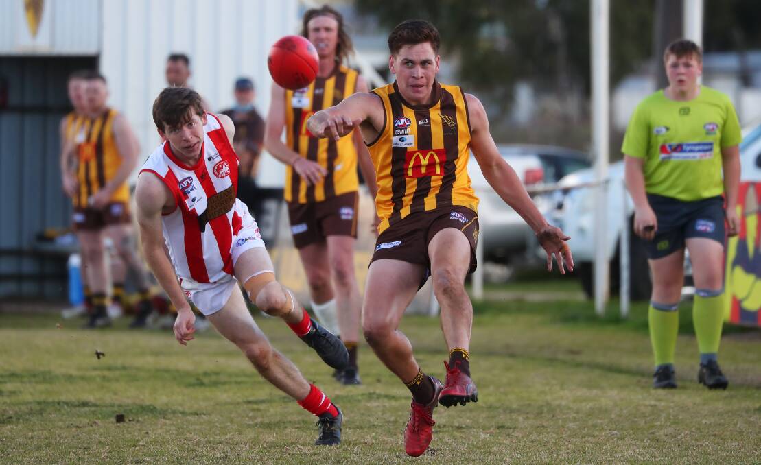WAITING GAME: East Wagga Kooringal's Alex Rogers
gets a kick away during their win over Charles Sturt
University on Saturday. Picture: Emma Hillier