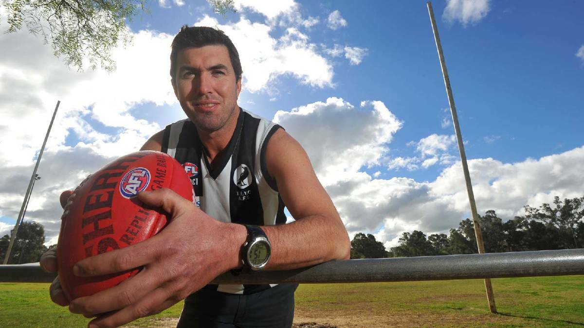 TOP DOG: The Rock-Yerong Creek stalwart Michael Mazzocchi, pictured before his 200th game in 2013, has been appointed Turvey Park's new coach. 