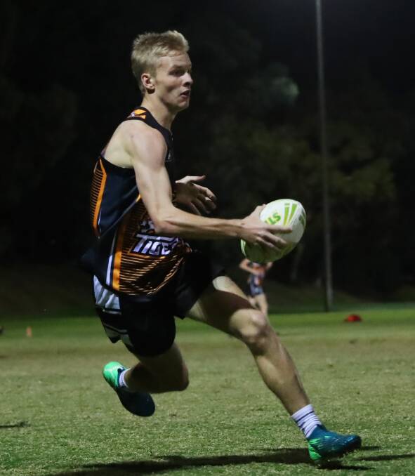 The Tigers held off Storm 7-5 in the inaugural mixed touch premier league decider on Tuesday night.