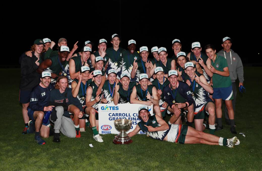 CHAMPIONS: The Riverina Anglican College celebrate their Carroll Cup final win. Picture: Les Smith
