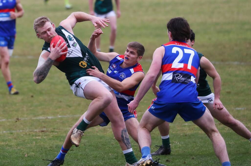 ON HUNT: Coolamon's Matt McGowan gets tackled during his side's six-point loss to Turvey Park at Kindra Park on Sunday. Picture: Emma Hillier
