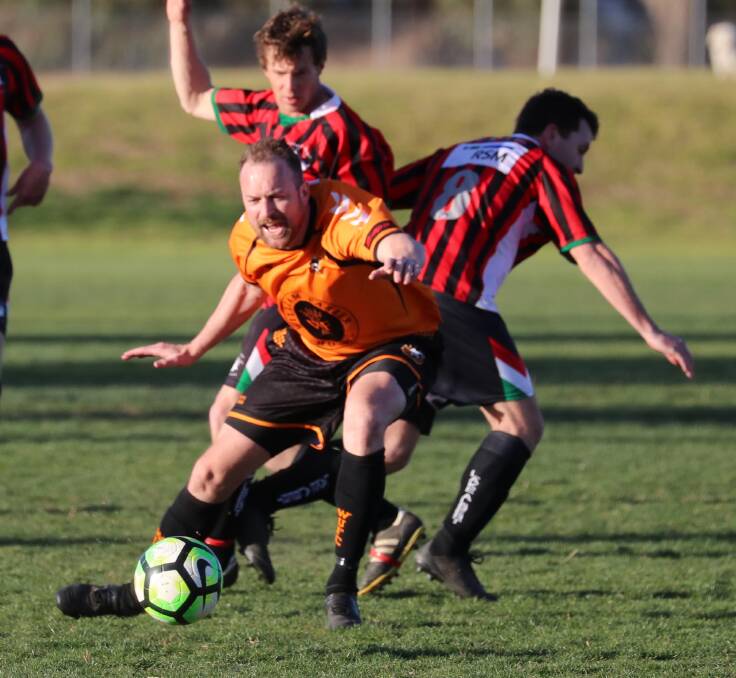 CRUCIAL GAME: Wagga United captain Lincoln Weir in action against Lake Albert last year. Picture: Les Smith.
