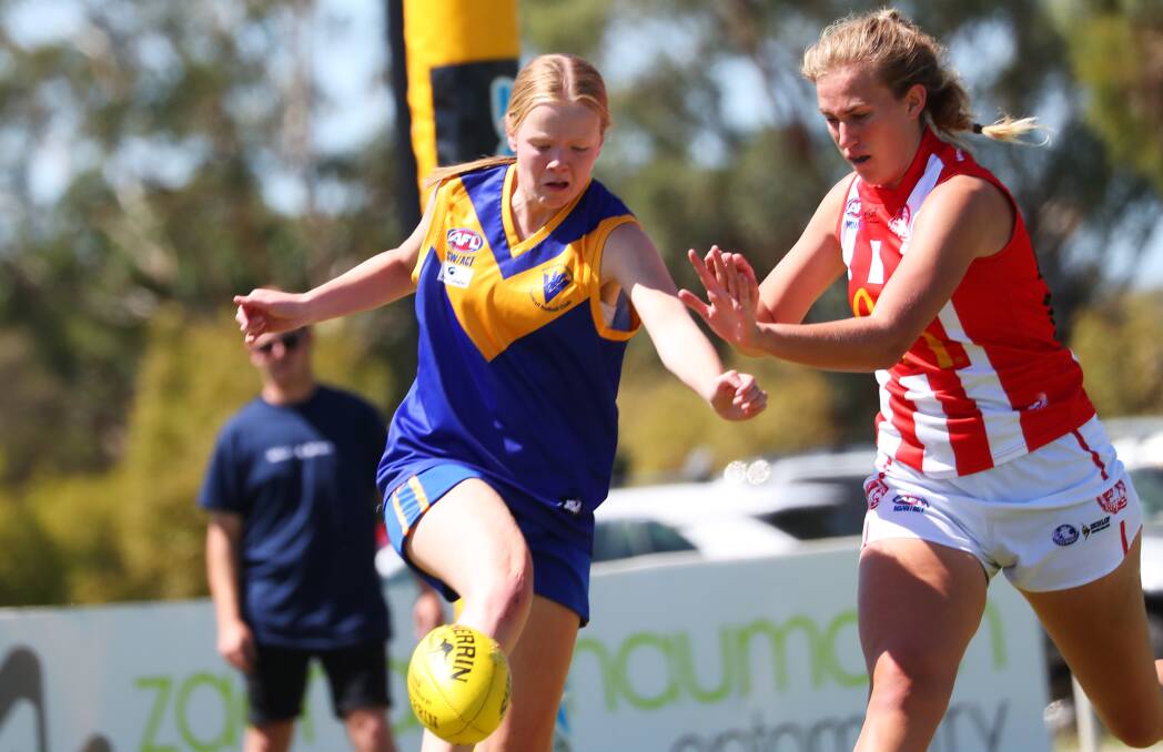 Jacinta Smith and Emily Newton do battle in a women's game earlier this year. Picture: Emma Hillier
