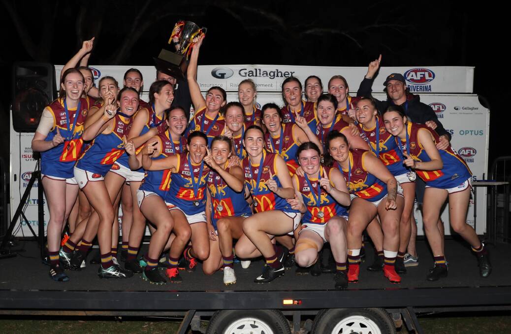 CHAMPIONS: Ganmain-Grong Grong-Matong with the trophy after Friday night's AFL Southern NSW Women's grand final win. Picture: Les Smith 