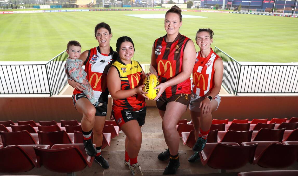 EXPANDING: Sarah Harmer, Kyra Jackson, Hannah Finemore and Gabrielle Goldsworthy Before a round of the AFL Southern Women's competition last year. Picture:: Les Smith