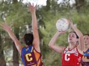 OPTIONS: Collingullie-Glenfield Park's Tameka Scott is defended by GGGM's Chloe Hamblin at Ganmain Sportsground on Saturday. Picture: Les Smith