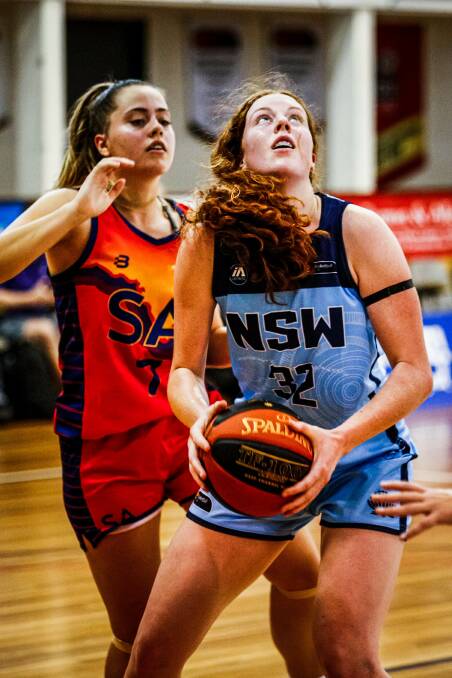 TALENT: Adelong basketballer Amelia Hassett in action for NSW during the Australian under-20 championships in Mackay this week. Picture: Jarrod Potter/Basketball Victoria