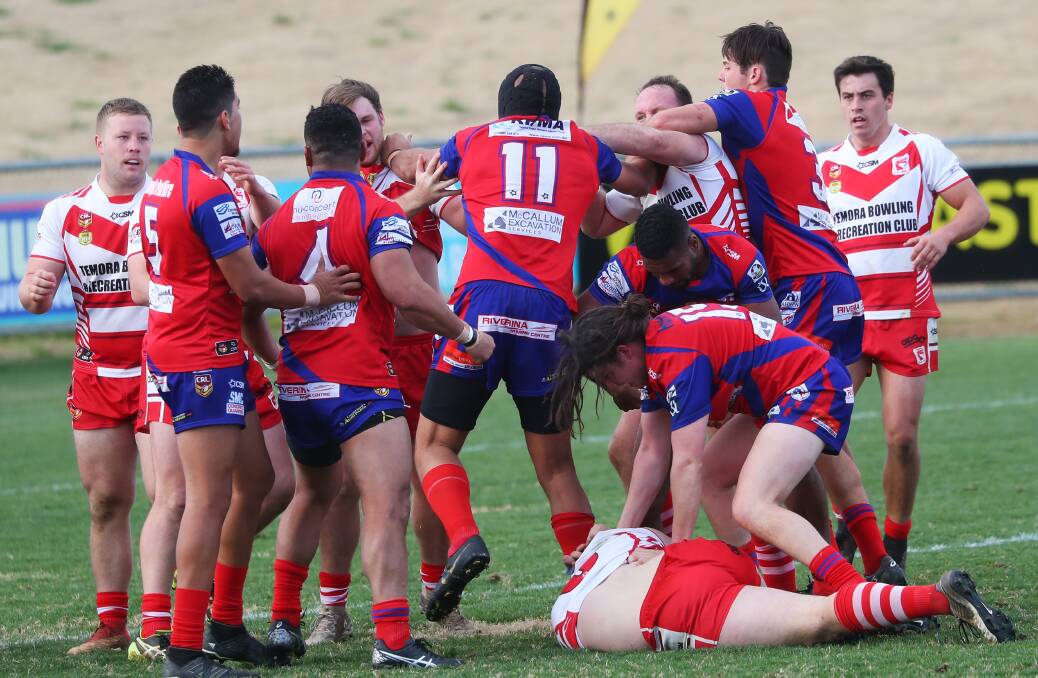 TEMPERS FRAYED: Temora Dragons and Wagga Kangaroos players get heated during a tense clash at Equex Centre on Sunday. Picture: Emma Hillier