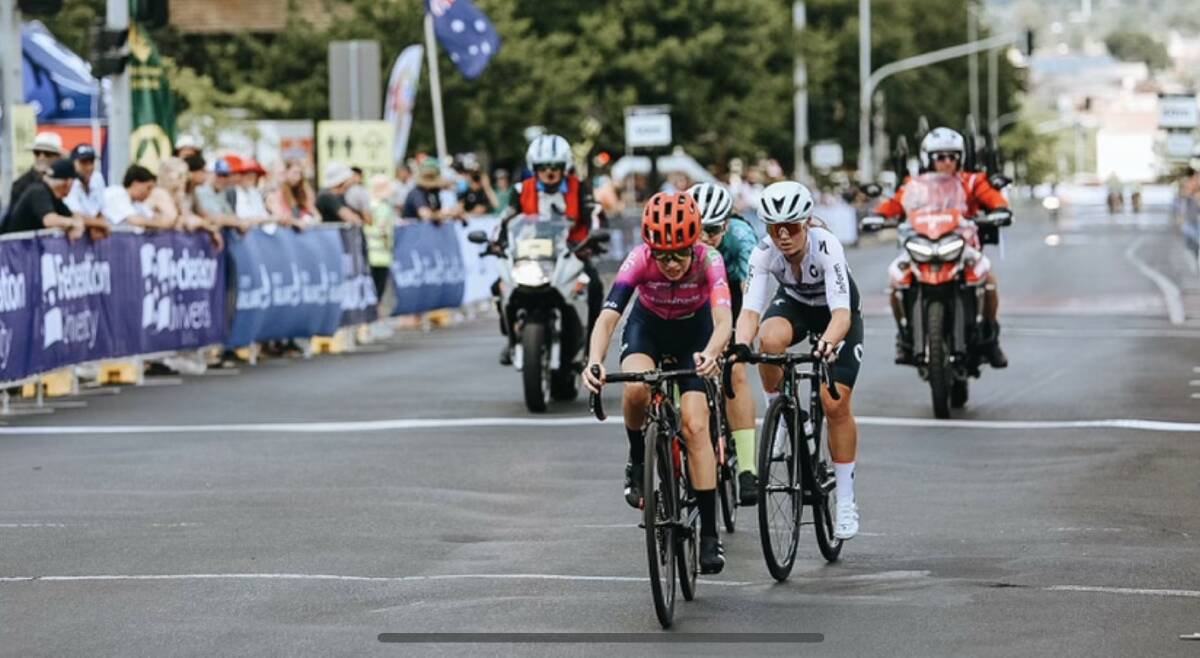 DIGGING DEEP: Bronte Stewart (pink) on her way to finishing third in the junior women's cirterium at the Road Nationals in Ballarat. 